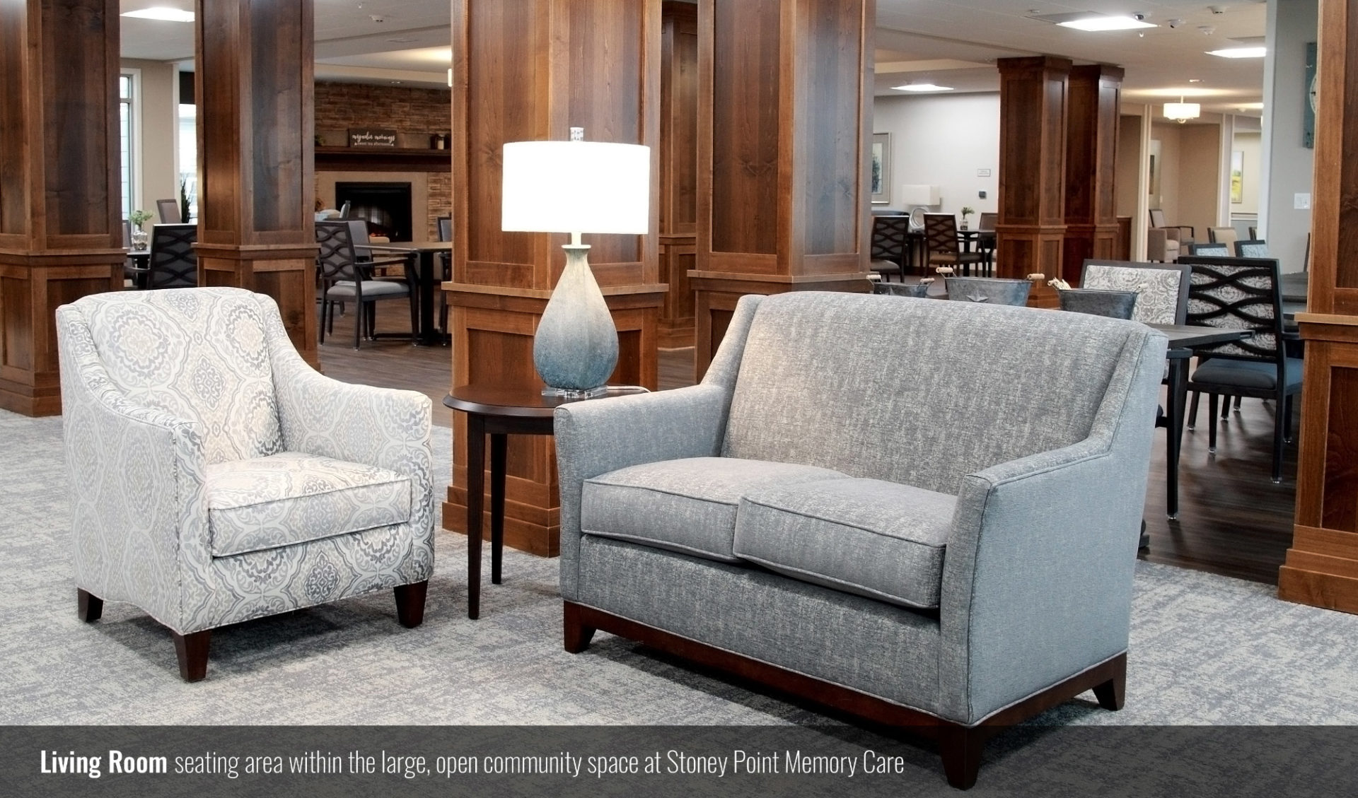 Living Room; seating area within the large, open community space at Stoney Point Memory Care