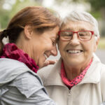 Senior Living, mother and daughter greeting
