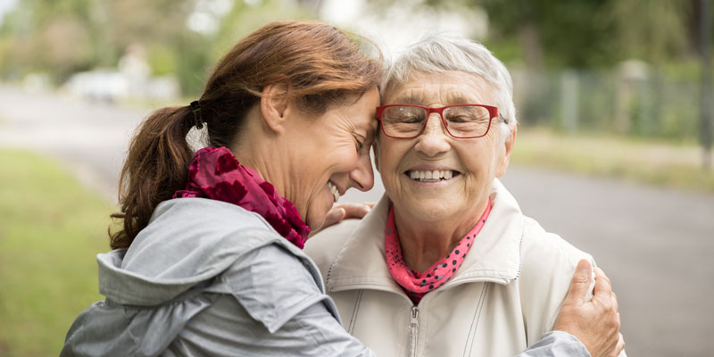 Senior Living, mother and daughter greeting