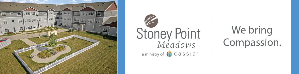 Aerial view of Stoney Point Meadows assisted living community with landscaped courtyard and walking paths.